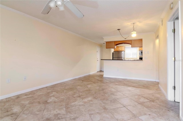 unfurnished living room featuring crown molding and ceiling fan