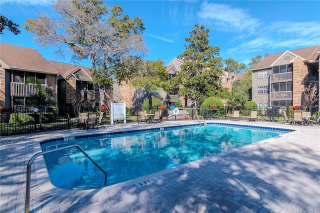 view of pool with a patio area