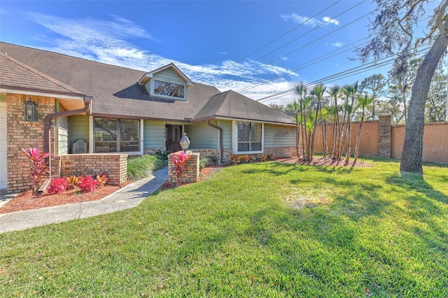 view of front of home with a front yard