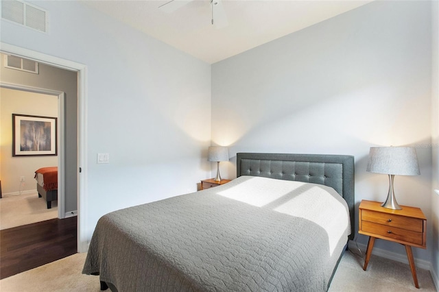 carpeted bedroom with ceiling fan