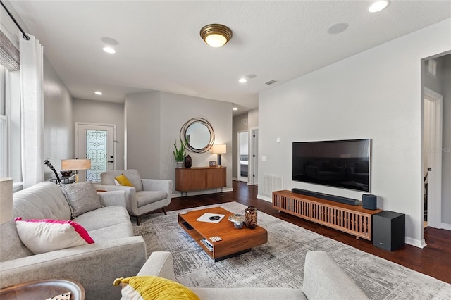 living room featuring dark hardwood / wood-style floors