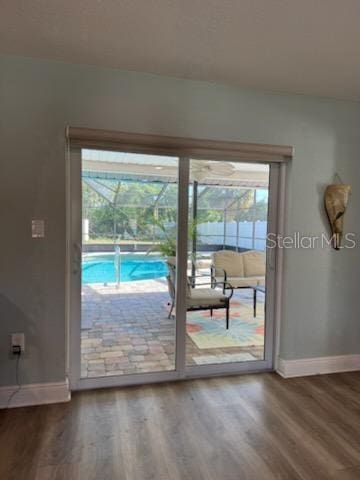 entryway with wood-type flooring