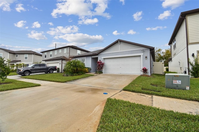 view of front facade featuring a garage and a front lawn