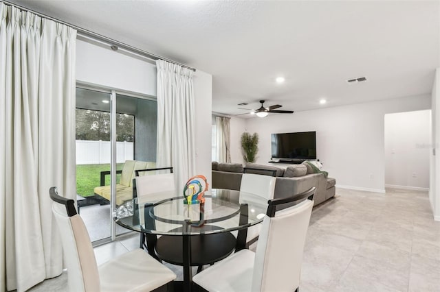 dining room with ceiling fan