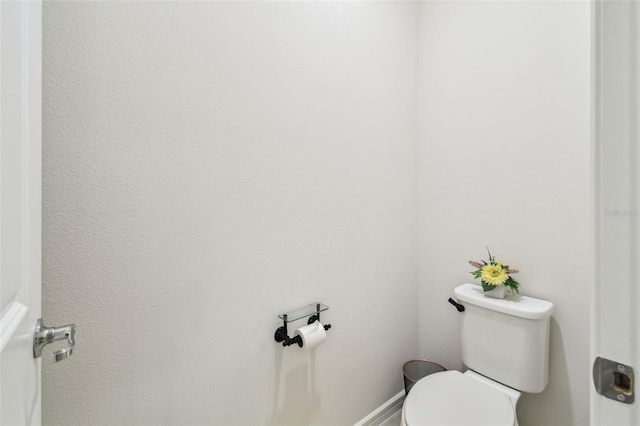 bathroom featuring toilet