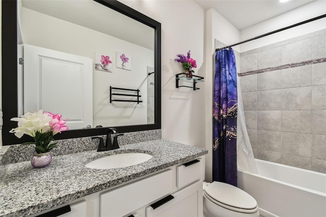 full bathroom featuring vanity, shower / bathtub combination with curtain, and toilet