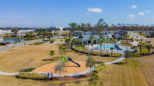 birds eye view of property featuring a water view