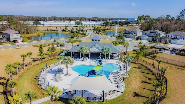 birds eye view of property featuring a water view