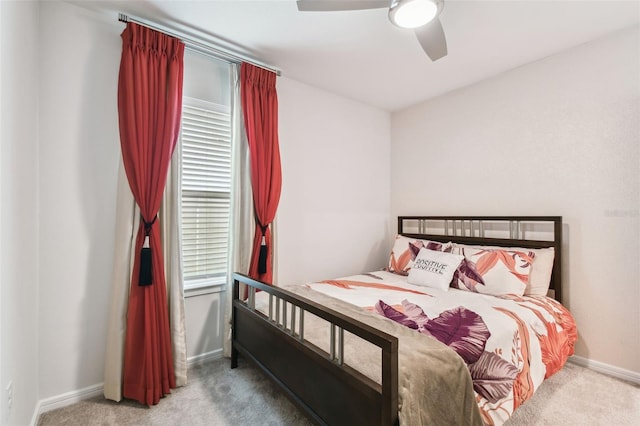 6684 Devlin Ln, Wesley Chapel, FL 33545 - carpeted bedroom featuring baseboards and ceiling fan