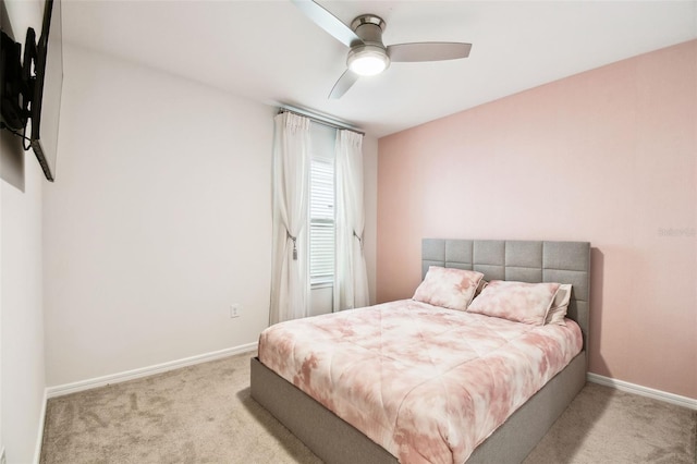 6684 Devlin Ln, Wesley Chapel, FL 33545 - carpeted bedroom with ceiling fan and baseboards