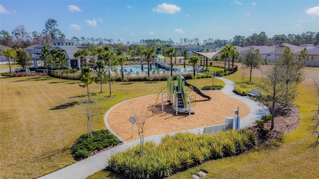 6684 Devlin Ln, Wesley Chapel, FL 33545 - view of playground featuring a yard and a residential view