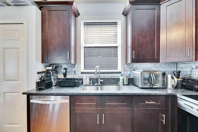 kitchen with stainless steel appliances, tasteful backsplash, sink, and dark brown cabinetry