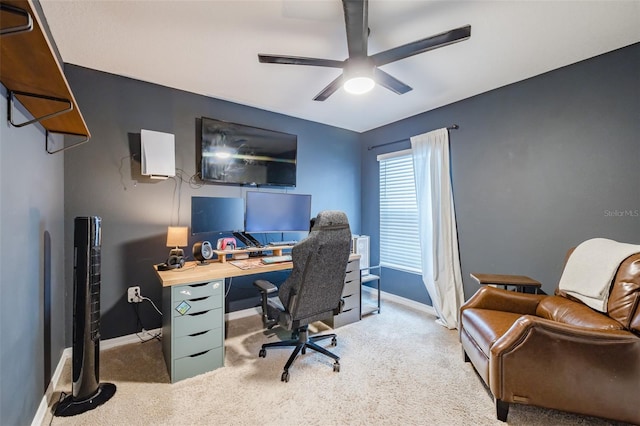 office featuring ceiling fan and light colored carpet