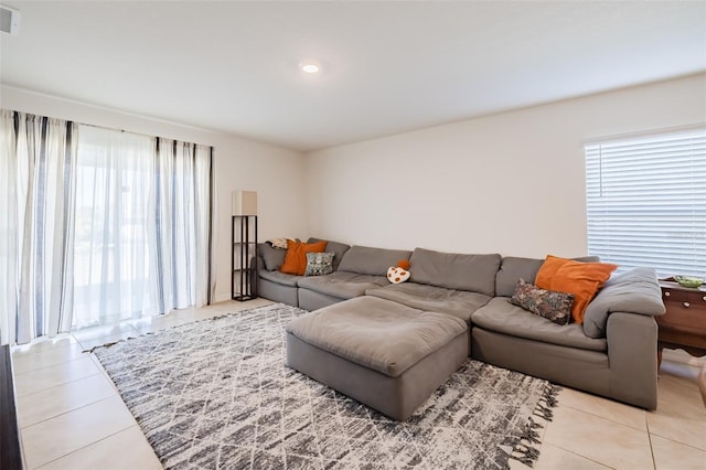 living room featuring light tile patterned floors