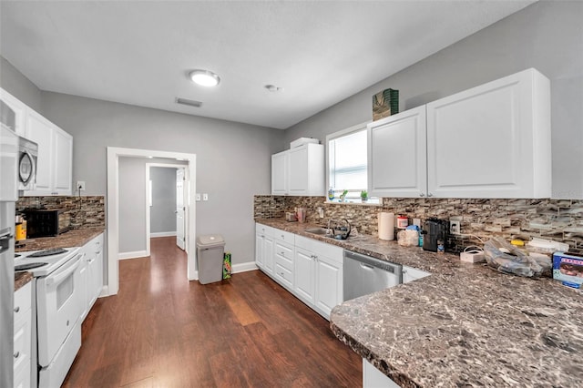 kitchen featuring tasteful backsplash, white cabinetry, dishwasher, dark stone counters, and white range with electric cooktop