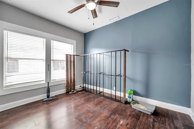 unfurnished room featuring ceiling fan and wood-type flooring