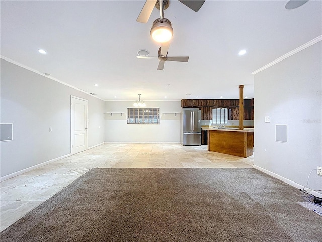 unfurnished living room with light carpet, crown molding, and ceiling fan