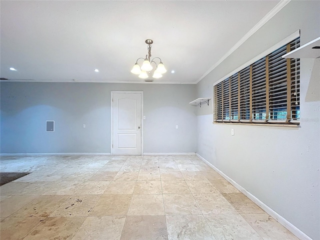 empty room with ornamental molding and an inviting chandelier