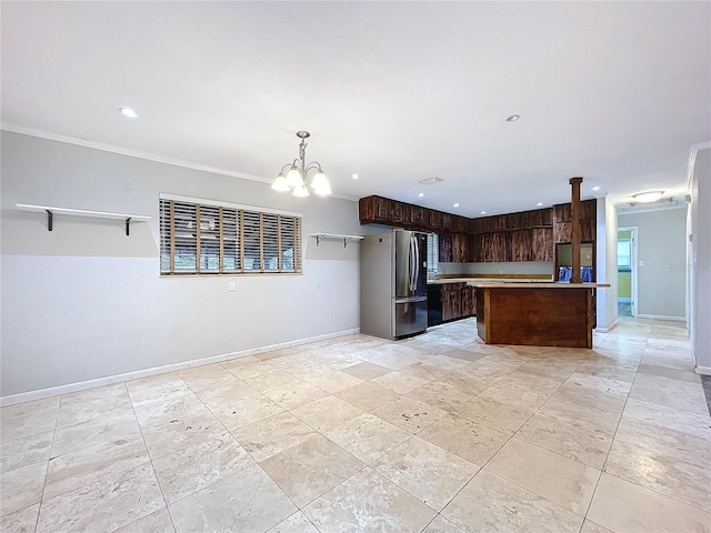 kitchen with crown molding, stainless steel refrigerator, dark brown cabinets, a kitchen island, and decorative light fixtures