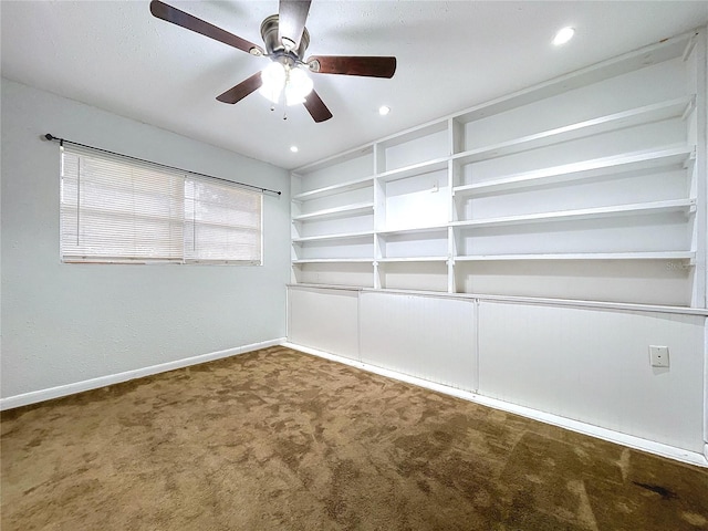 carpeted empty room with ceiling fan