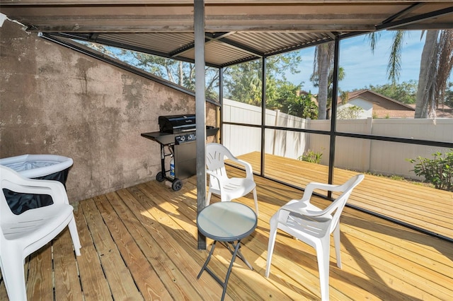 wooden terrace with area for grilling