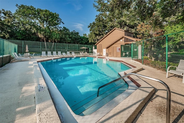 view of pool featuring a patio