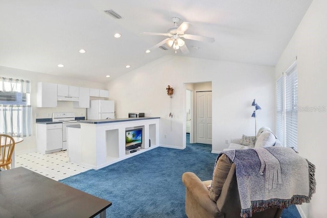 carpeted living room with lofted ceiling and ceiling fan