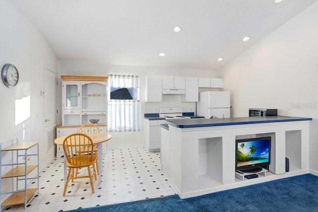 kitchen with white cabinetry and white appliances