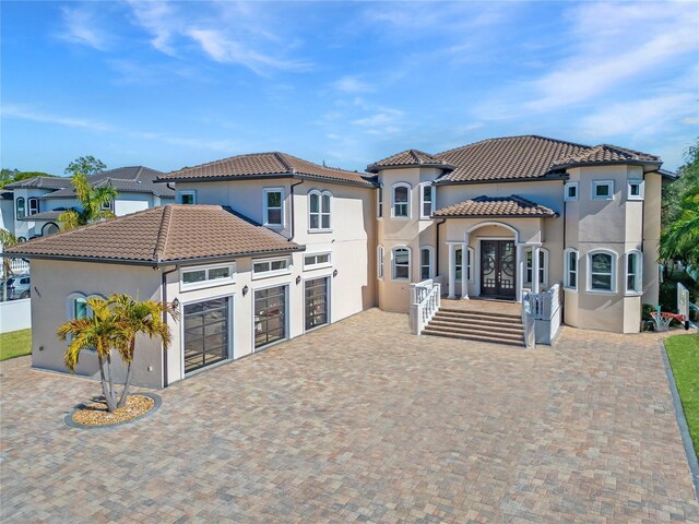 view of front of property with a garage