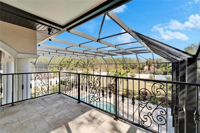 view of patio / terrace with a fenced in pool and a lanai