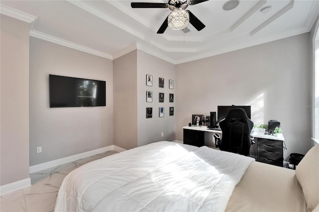 bedroom featuring ornamental molding, ceiling fan, and a tray ceiling