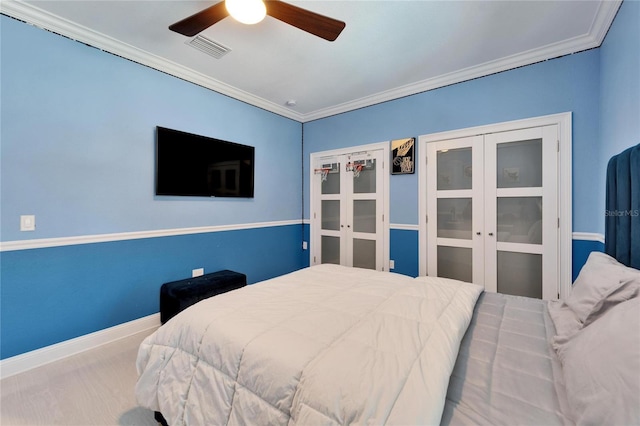 bedroom featuring ornamental molding, french doors, and ceiling fan