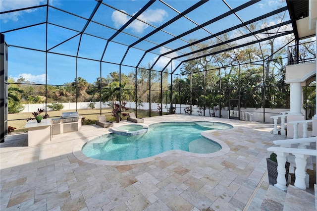 view of swimming pool featuring a patio area, area for grilling, a lanai, an in ground hot tub, and exterior kitchen