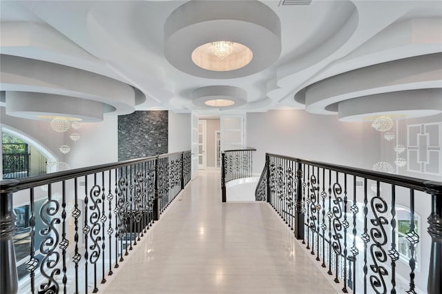 9401 93rd St, Seminole, FL 33777 - hallway featuring a chandelier