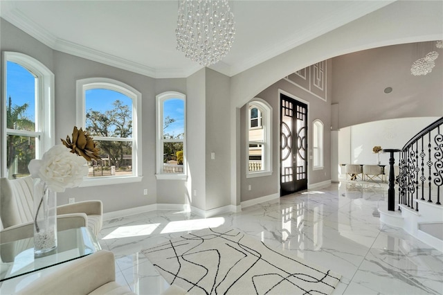9401 93rd St, Seminole, FL 33777 - entrance foyer with stairs, arched walkways, marble tiled flooring, a chandelier, and ornamental molding