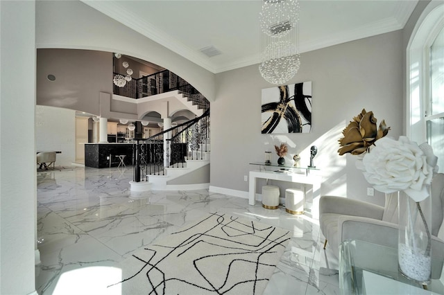 9401 93rd St, Seminole, FL 33777 - entryway with marble tiled flooring, a chandelier, stairway, arched walkways, and ornamental molding