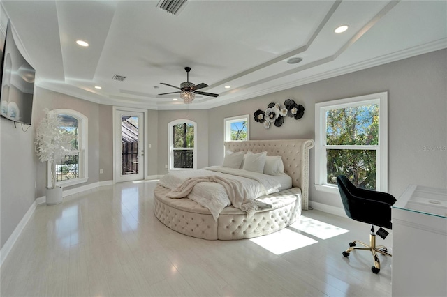 9401 93rd St, Seminole, FL 33777 - bedroom featuring a tray ceiling, recessed lighting, baseboards, access to outside, and an office area