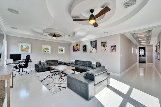 9401 93rd St, Seminole, FL 33777 - living room featuring a raised ceiling, a ceiling fan, an office area, ornamental molding, and baseboards