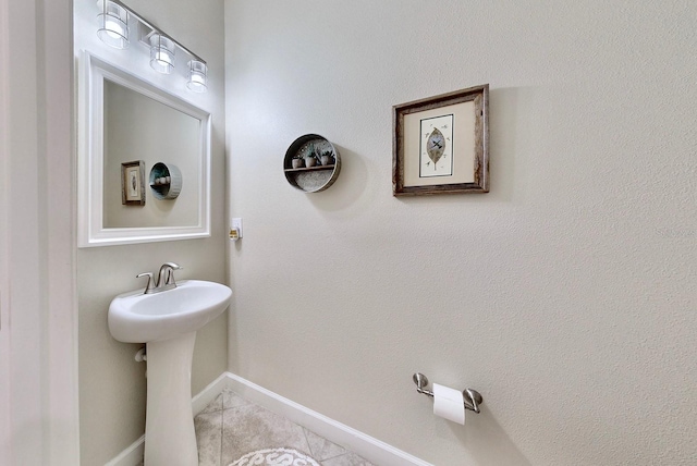 bathroom featuring sink and tile patterned floors