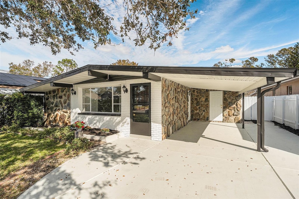 view of front of house with a carport