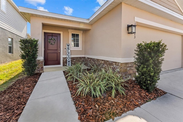 property entrance with a garage