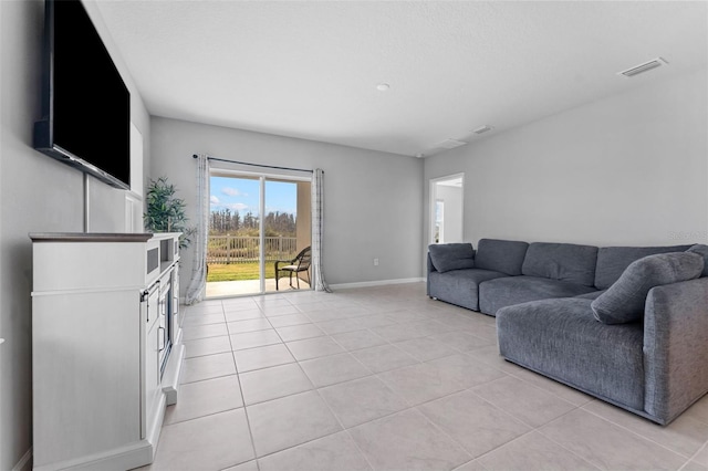 living room featuring light tile patterned floors