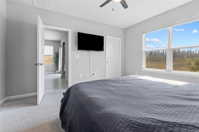 bedroom featuring ceiling fan and carpet floors