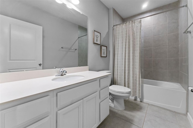 full bathroom with shower / bath combination with curtain, vanity, toilet, and tile patterned flooring