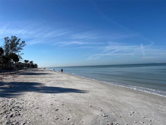 property view of water featuring a beach view