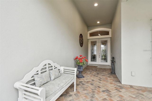 view of exterior entry featuring french doors