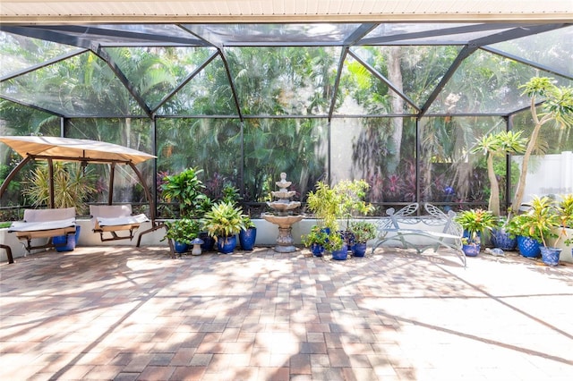 view of patio with a lanai