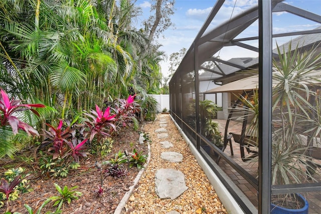 view of yard with a lanai