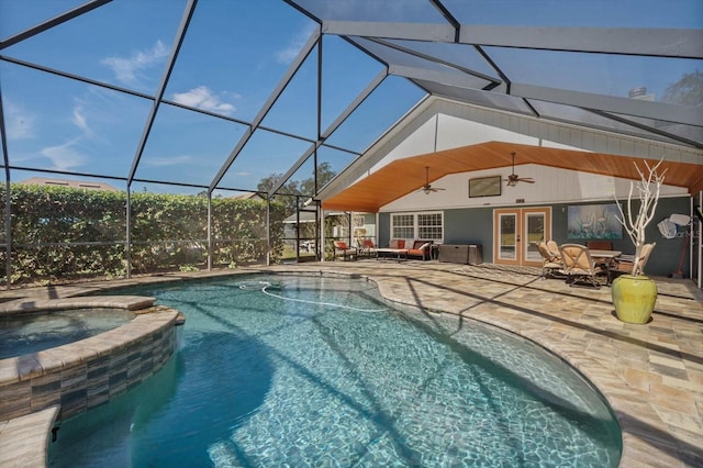 view of swimming pool with french doors, glass enclosure, an in ground hot tub, ceiling fan, and a patio