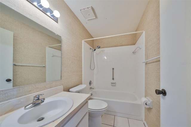 full bathroom featuring tile patterned flooring, vanity, washtub / shower combination, and toilet